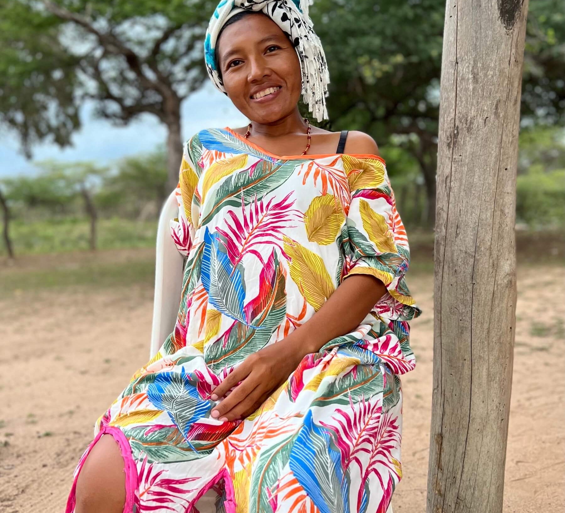 Wayuu woman in colourful "manta" dress and headscarf