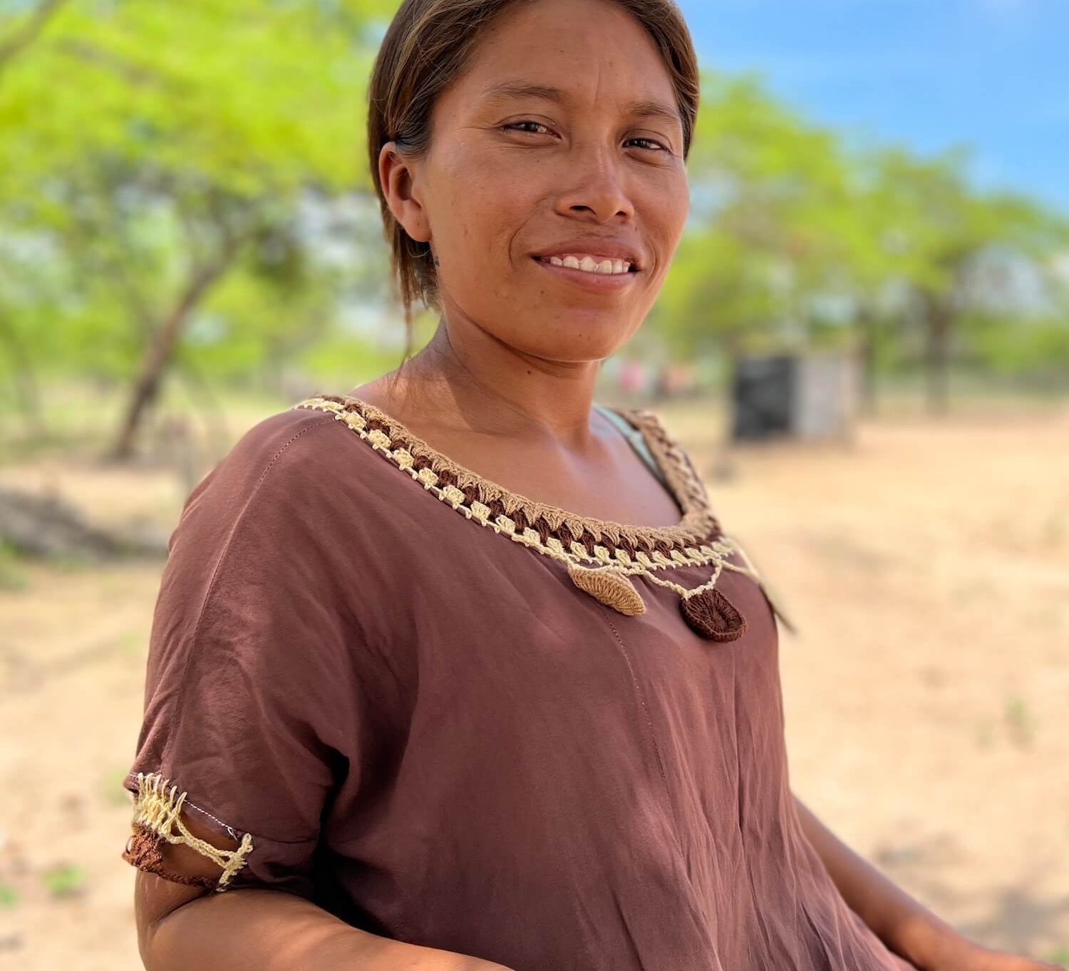 Wayuu woman in a traditional "manta" dress in a rural village