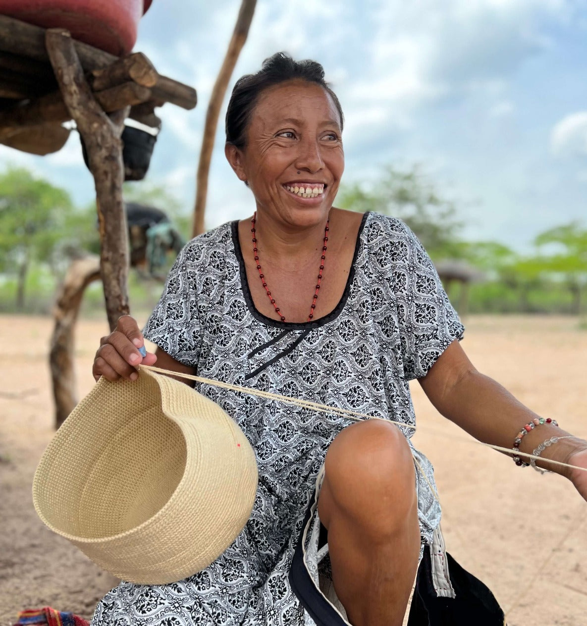 Wayuu woman crocheting a mochila crossbody bag